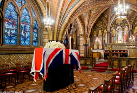 Baroness Thatcher`s coffin is taken back to Parliament